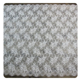 Nylon het Kantstof van de Ivoor Bloemen Gegratineerde Gescherpte Normale Vervende Bruids Kleding leverancier