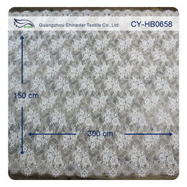 Nylon het Kantstof van de Ivoor Bloemen Gegratineerde Gescherpte Normale Vervende Bruids Kleding leverancier