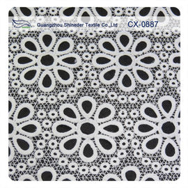 Witte Geborduurde Kantstof, Polyester herhaald Bloemen de Stoffenkledingstuk van de Knopzijde leverancier